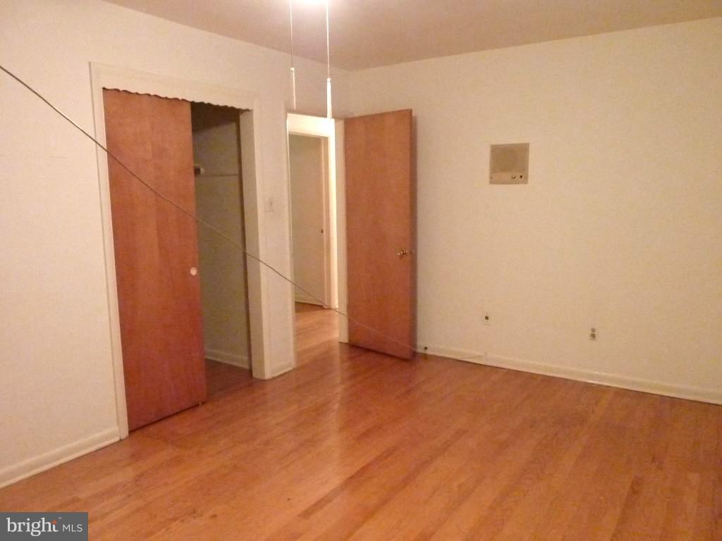 1505 Hamlin Street Northeast Washington, DC 20017 - Photo 17 of 30 an empty room with closet area