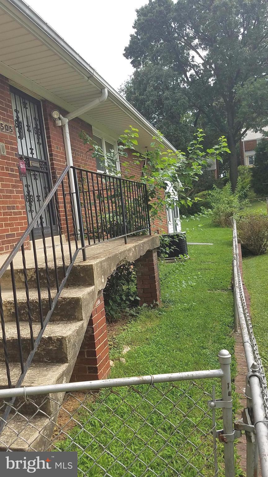 1505 Hamlin Street Northeast Washington, DC 20017 - Photo 4 of 30 a view of a house with a yard