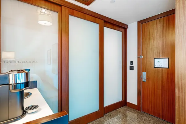 a view of kitchen with wooden floor