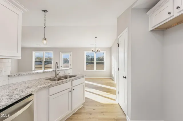 a front view of a house with wooden floor
