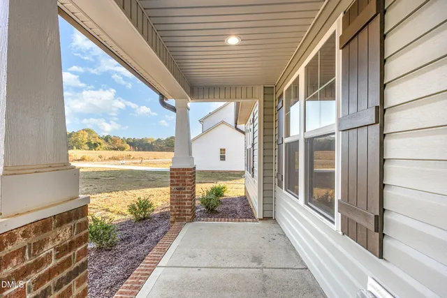 a view of a train station from a balcony