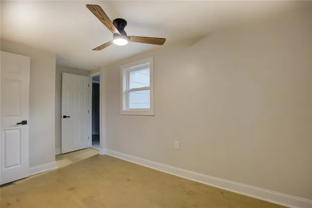 an empty room with windows