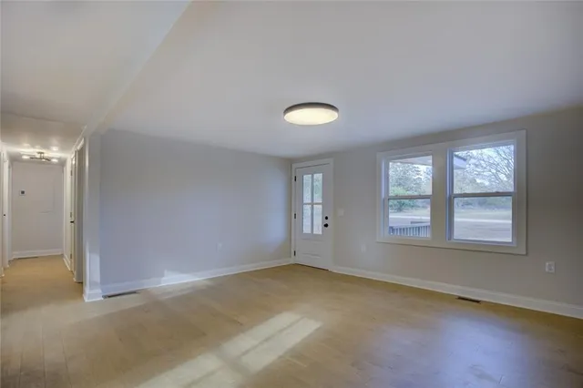 an empty room with windows