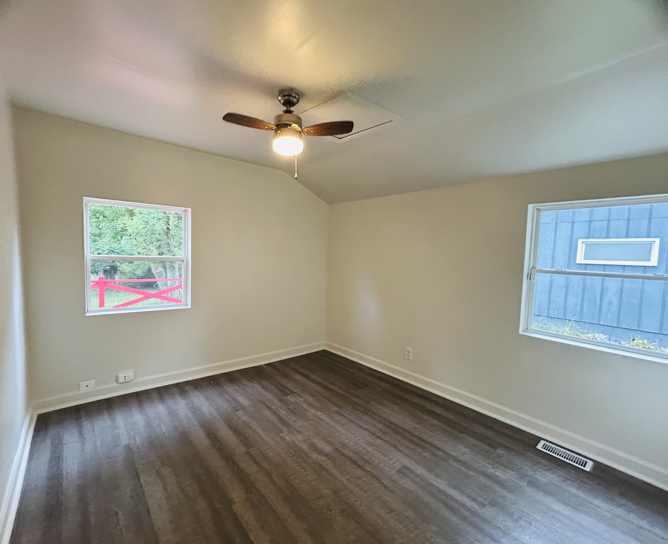 6415 North Shore Avenue Spring Grove, IL 60081 - Photo 11 of 18 a view of an empty room with wooden floor and a window