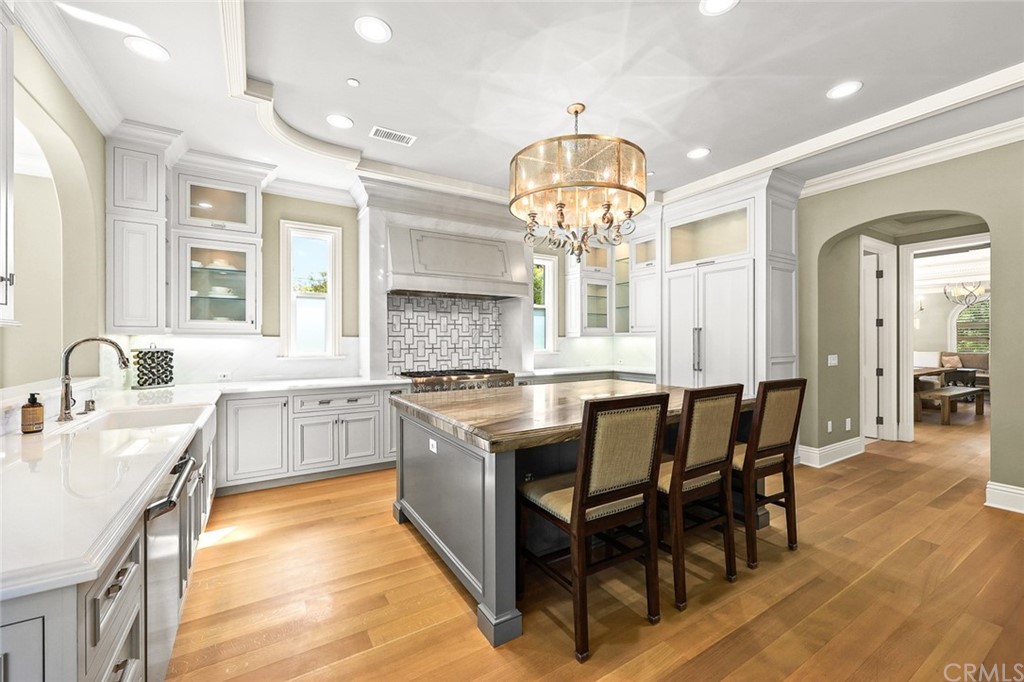 230 San Miguel Drive Arcadia, CA 91007 - Photo 15 of 57 a large kitchen with a table and chairs
