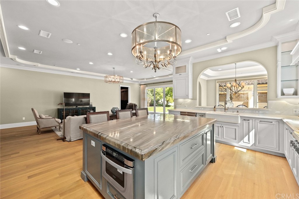 230 San Miguel Drive Arcadia, CA 91007 - Photo 16 of 57 a kitchen with stainless steel appliances granite countertop a stove and cabinets