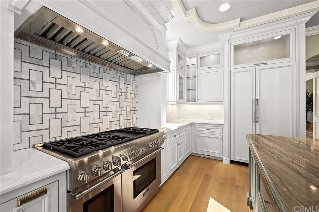 230 San Miguel Drive Arcadia, CA 91007 - Photo 18 of 57 a kitchen with stainless steel appliances granite countertop a stove and a refrigerator