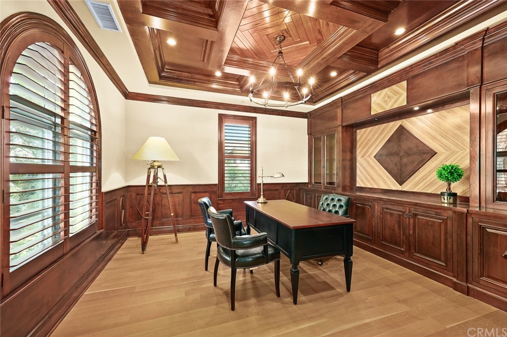230 San Miguel Drive Arcadia, CA 91007 - Photo 27 of 57 a dining room with furniture a chandelier and wooden floor