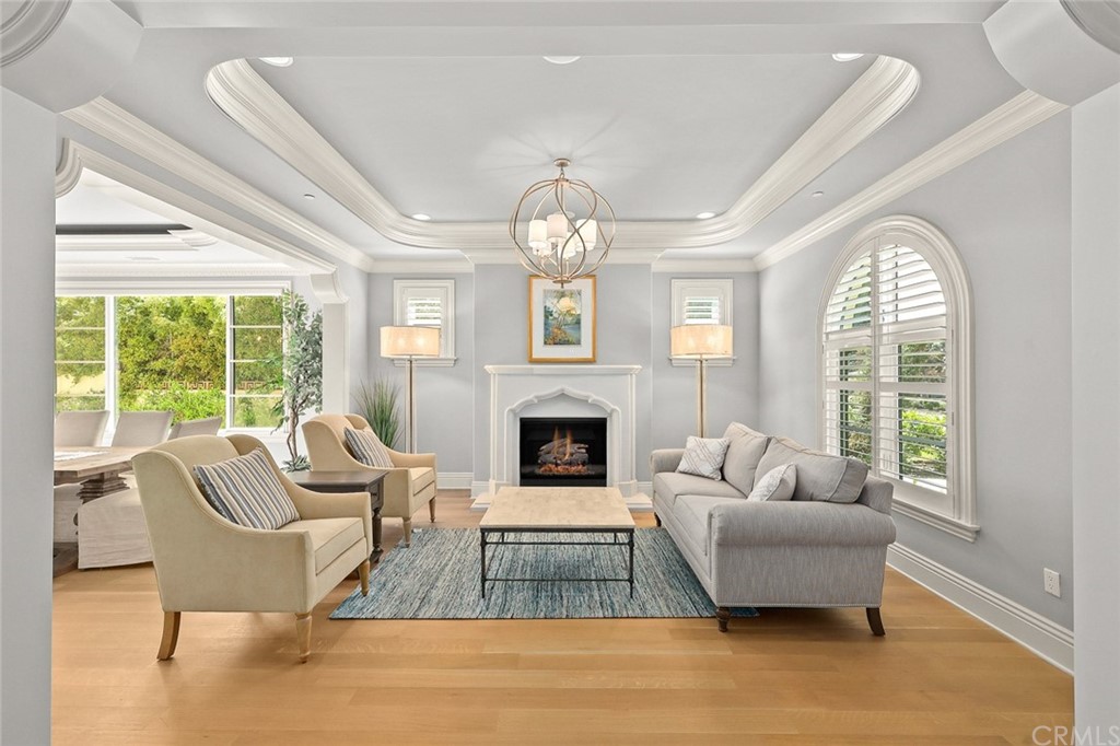 230 San Miguel Drive Arcadia, CA 91007 - Photo 8 of 57 a living room with furniture a fireplace and a large window