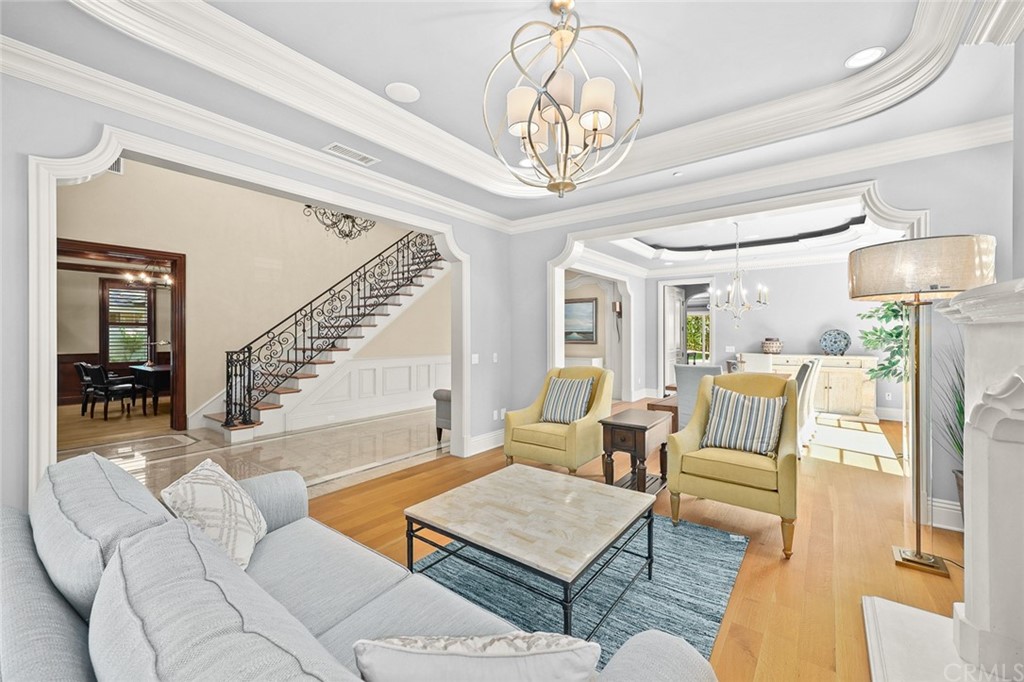 230 San Miguel Drive Arcadia, CA 91007 - Photo 9 of 57 a living room with furniture a chandelier and a dining table