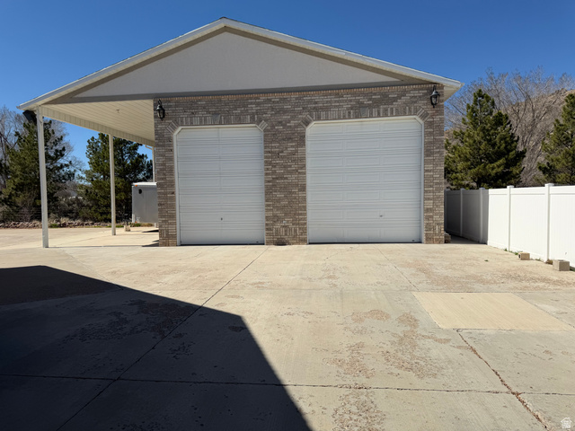 1697 West 2450 Vernal, UT 84078 - Photo 25 of 36 Detached garage with driveway