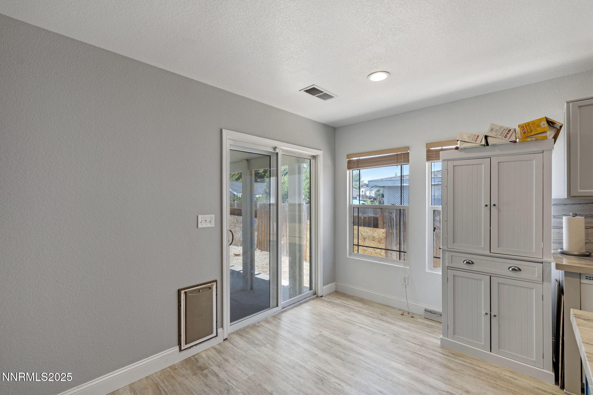 7721 Welsh Drive Reno, NV 89506 - Photo 14 of 27 a view of an empty room with a window