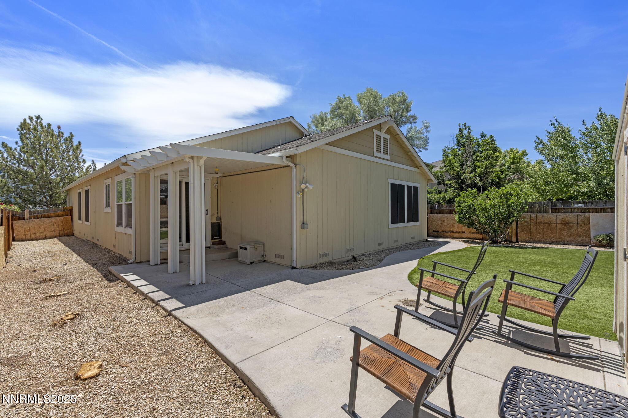 7721 Welsh Drive Reno, NV 89506 - Photo 25 of 27 a view of backyard with outdoor seating