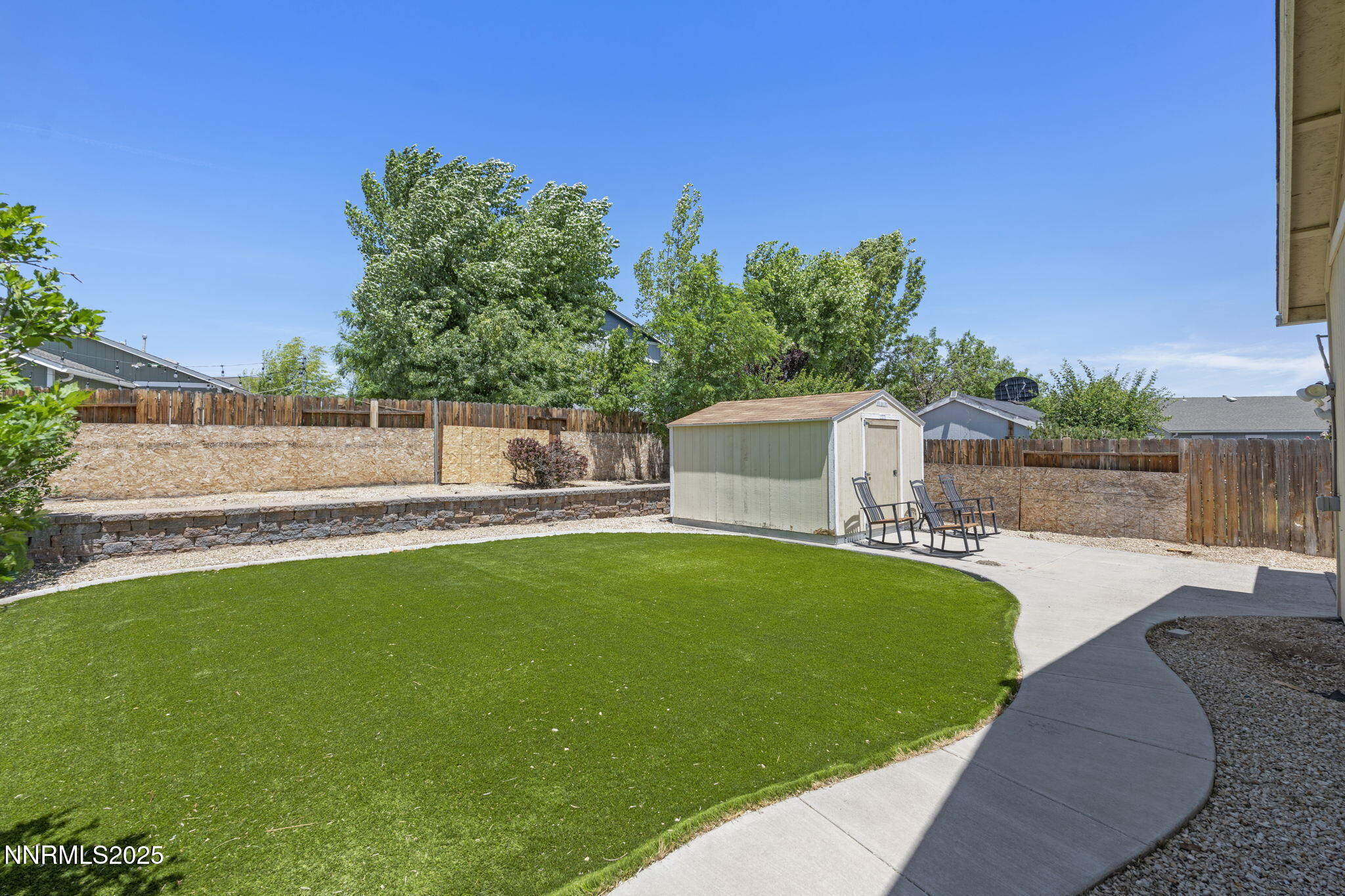 7721 Welsh Drive Reno, NV 89506 - Photo 26 of 27 a view of a swimming pool with a patio