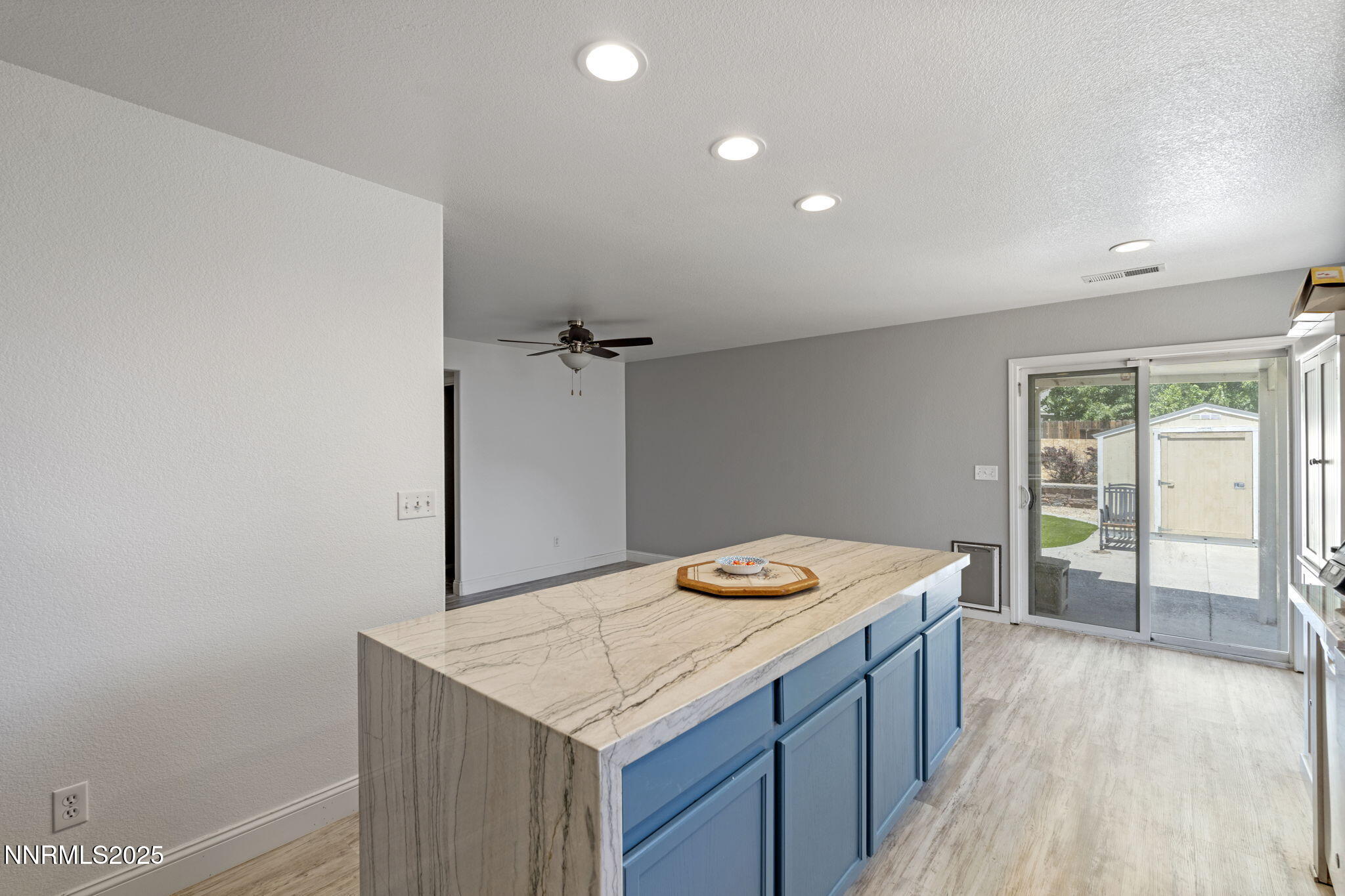 7721 Welsh Drive Reno, NV 89506 - Photo 7 of 27 a hallway with washer and dryer