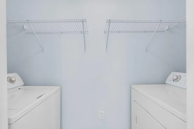 a utility room with dryer and washer
