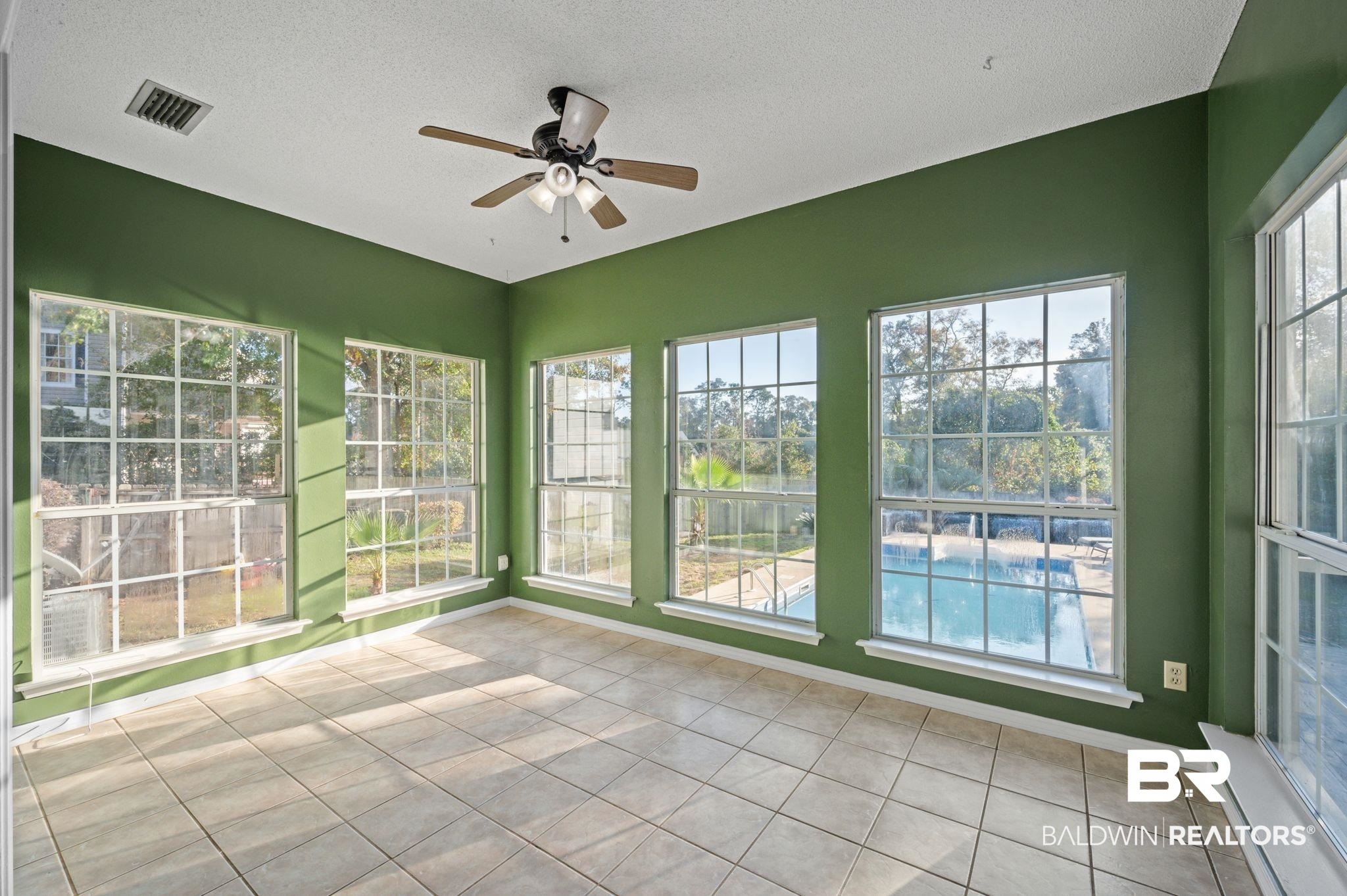100 Orleans Way Daphne, AL 36526 - Photo 13 of 31 Unfurnished sunroom featuring ceiling fan and plenty of natural light