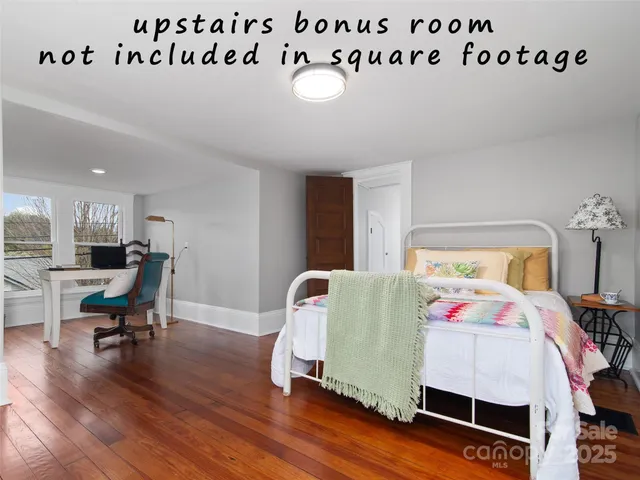 a bedroom with furniture and a bed