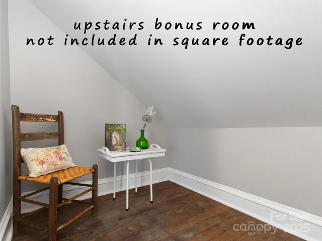 a workspace with furniture and wooden floor