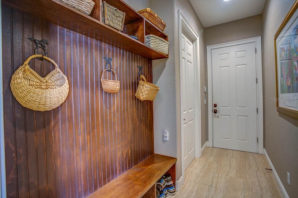 11002 Lake Butler Boulevard Windermere, FL 34786 - Photo 16 of 62 a view of hallway with washer and dryer