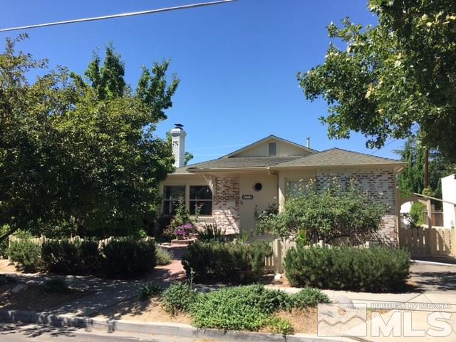 839 Monroe Street Reno, NV 89509 - Photo 1 of 1 a front view of a house with a garden