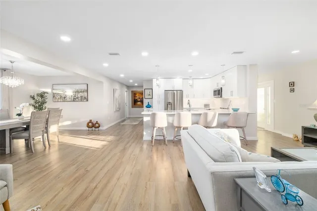 a living room with furniture and a table