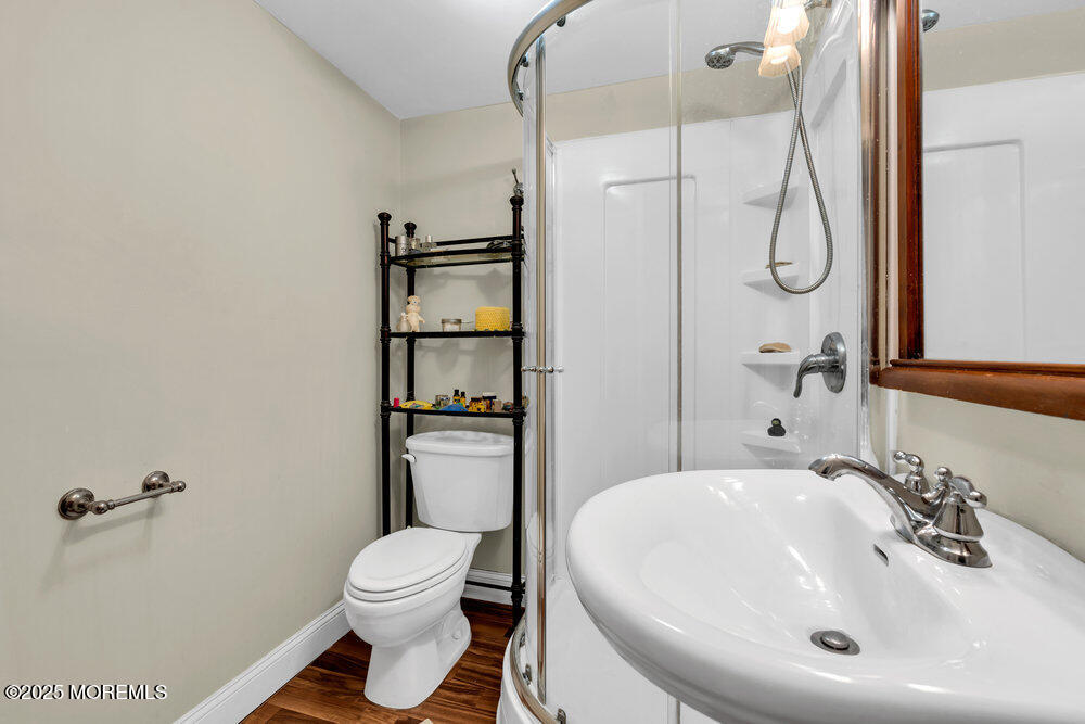 159 Bridge Avenue Red Bank, NJ 07701 - Photo 15 of 39 a bathroom with a toilet sink and shower