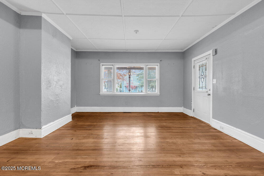 159 Bridge Avenue Red Bank, NJ 07701 - Photo 18 of 39 a view of empty room with wooden floor and fan