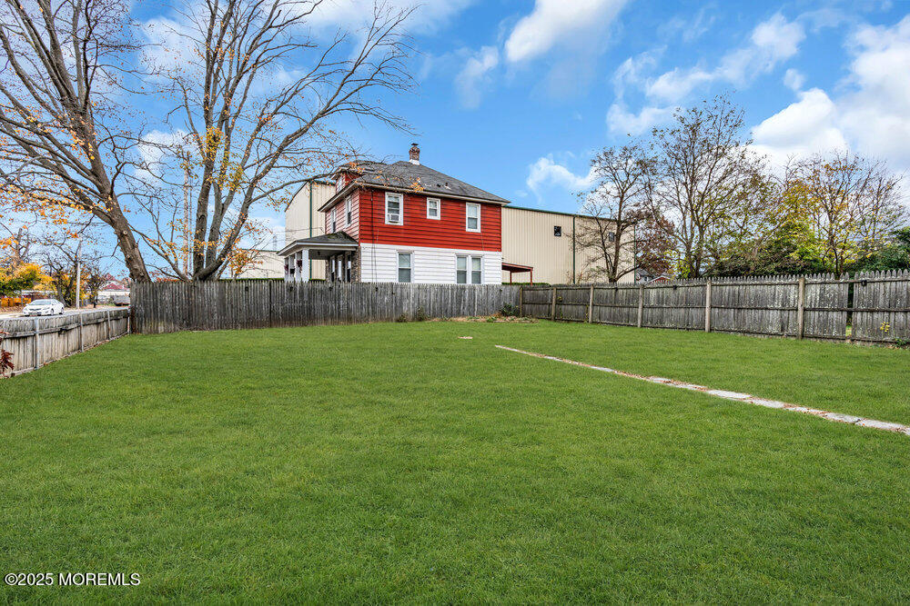 159 Bridge Avenue Red Bank, NJ 07701 - Photo 36 of 39 a front view of a house with a yard