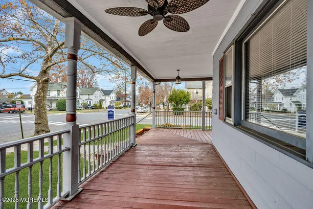 a view of a porch and wooden floor