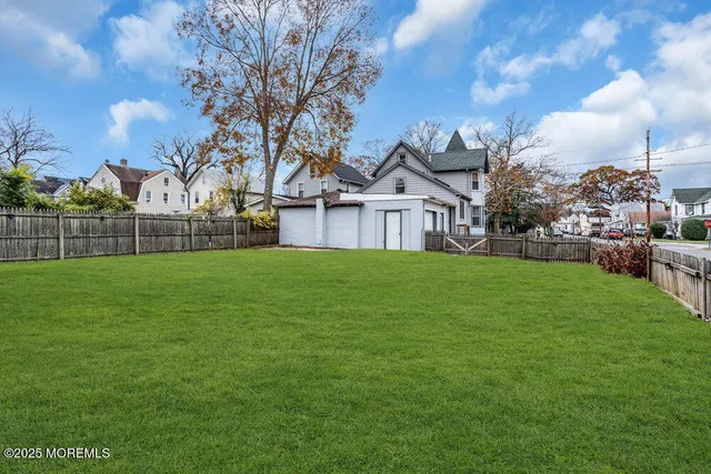 a view of a house with a big yard