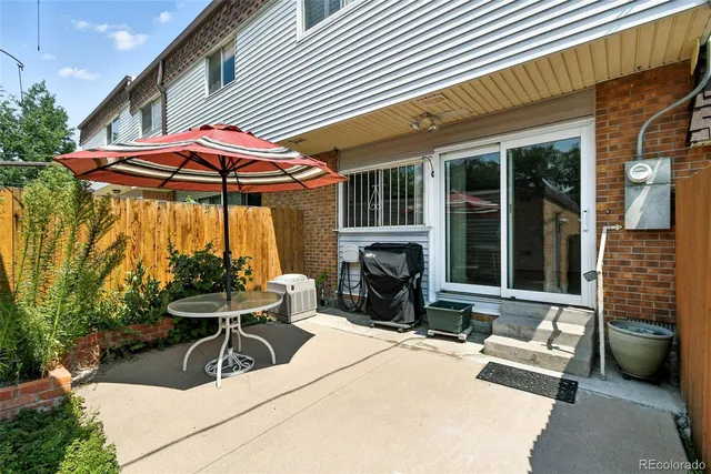 a view of a house with sitting area and furniture