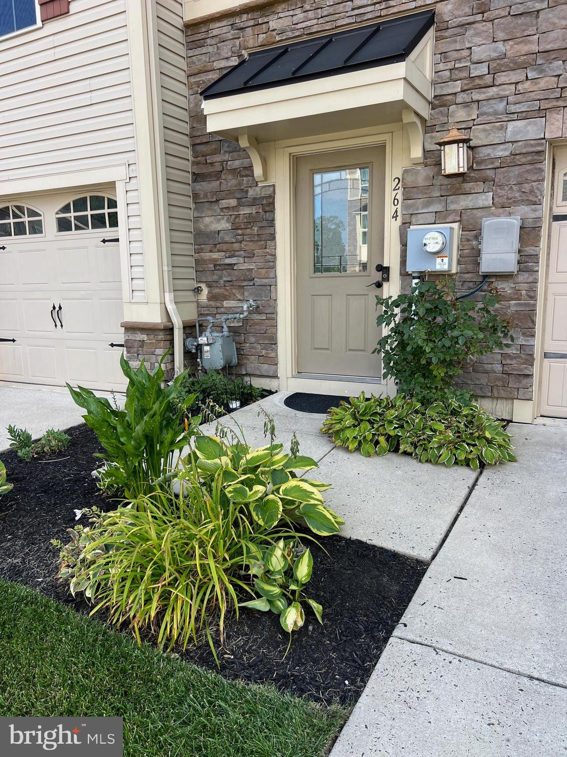 264 Iannelli Road Clarksboro, NJ 08020 - Photo 2 of 30 a view of a pathway with flower pots