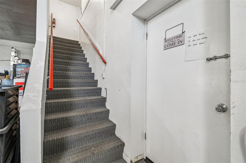 6010 Wall Street Port Richey, FL 34668 - Photo 13 of 43 a view of staircase with white walls