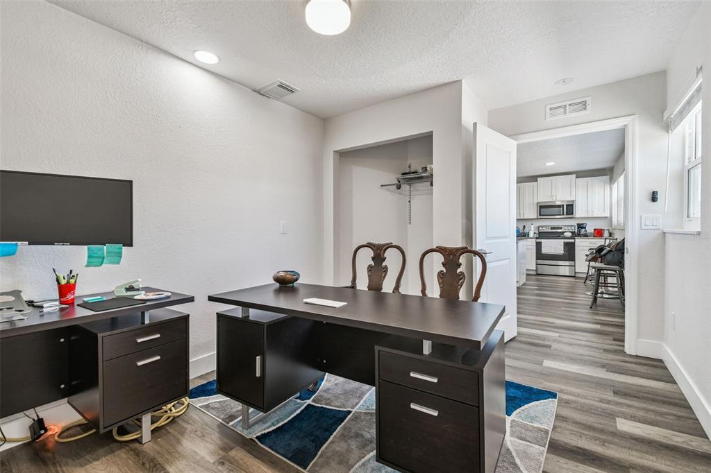 6010 Wall Street Port Richey, FL 34668 - Photo 20 of 43 a kitchen with a sink appliances and cabinets