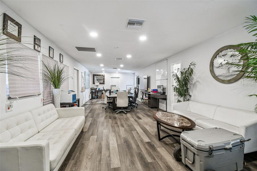 6010 Wall Street Port Richey, FL 34668 - Photo 35 of 43 a living room with furniture and a clock