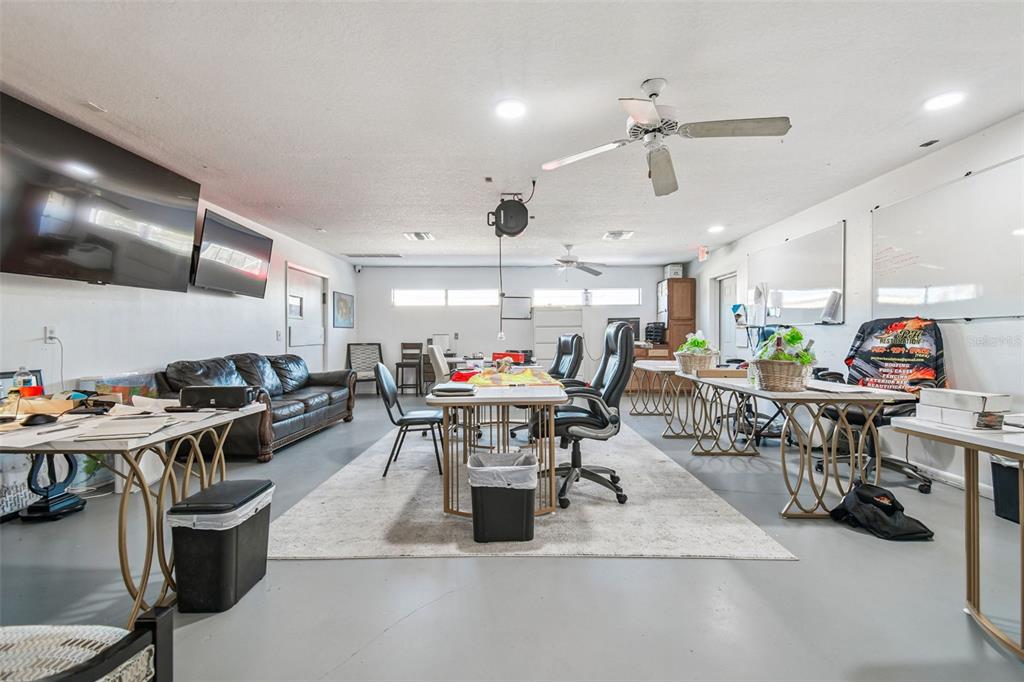 6010 Wall Street Port Richey, FL 34668 - Photo 8 of 43 a living room with lots of furniture and a large window