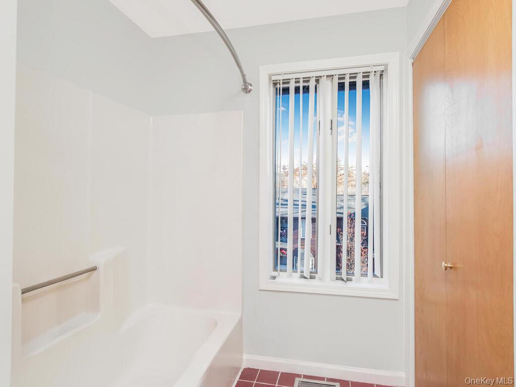 8 Davids Lane Ossining, NY 10562 - Photo 16 of 26 Full bath with shower combination and tile patterned flooring
