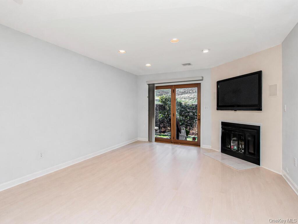 8 Davids Lane Ossining, NY 10562 - Photo 5 of 26 ** Virtually Cleared** Unfurnished living room with recessed lighting