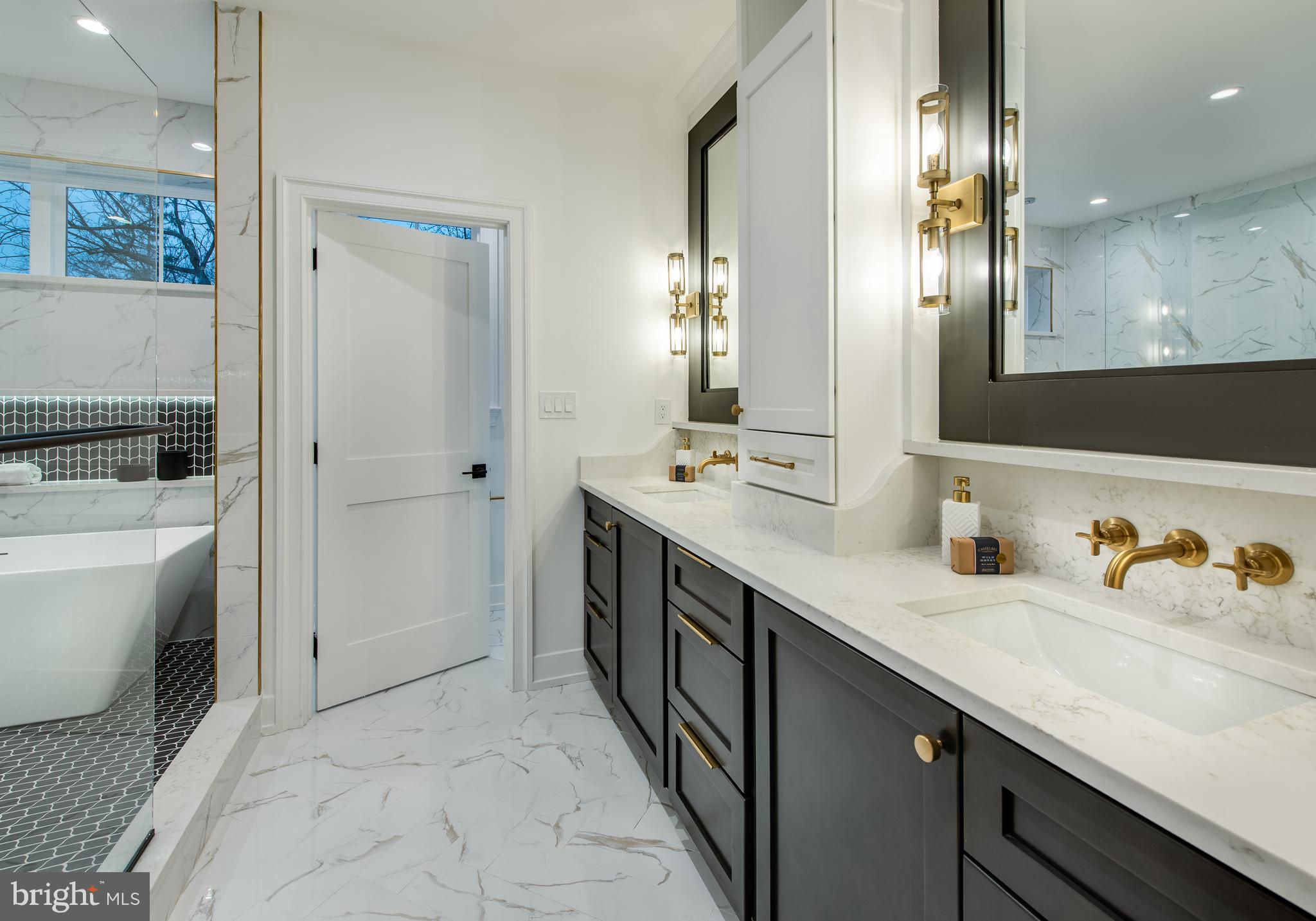 1541 Dowlin Forge Road Downingtown, PA 19335 - Photo 15 of 19 a spacious bathroom with a double vanity sink a mirror and shower