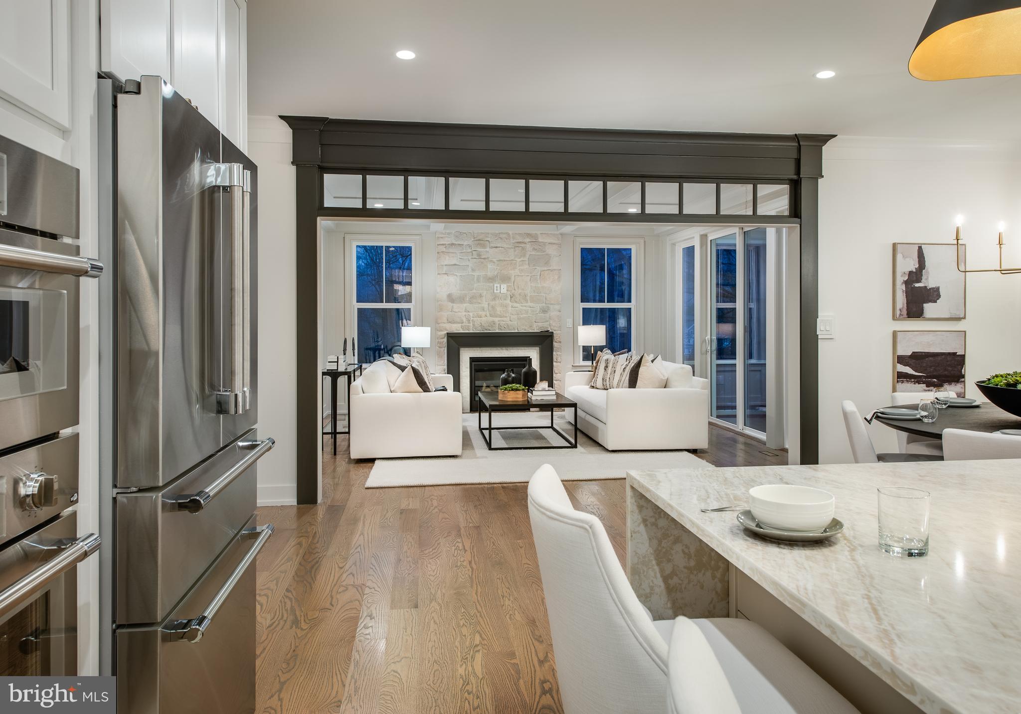 1541 Dowlin Forge Road Downingtown, PA 19335 - Photo 5 of 19 a living room with furniture and a fireplace