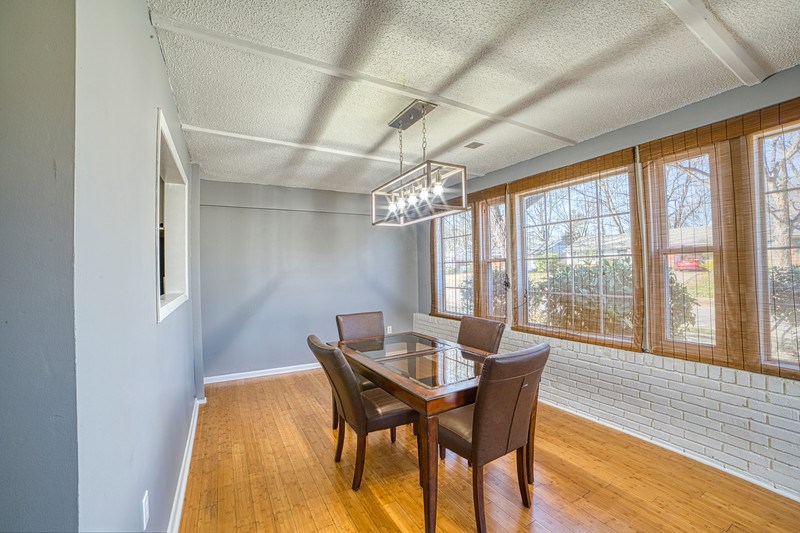 1600 Hopewell Road Memphis, TN 38117 - Photo 3 of 25 Fantastic Dining Room w/ well-placed windows for natural light. I love this light fixture!