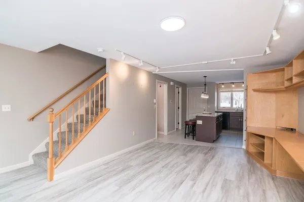 a view of livingroom with furniture and wooden floor