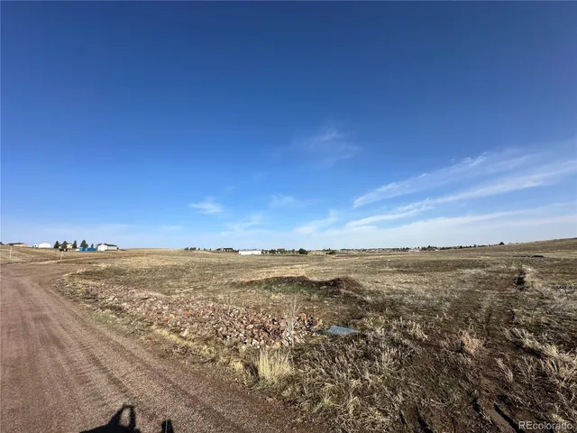 a view of a lake and mountain in back
