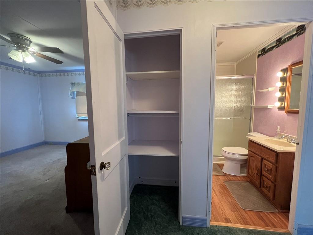 101 Filbert Road Butler, PA 16001 - Photo 18 of 37 a bathroom with a toilet and a shower