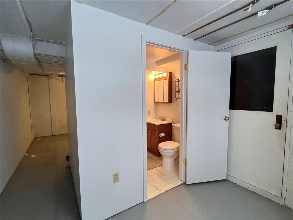 101 Filbert Road Butler, PA 16001 - Photo 33 of 37 a bathroom with a toilet sink and mirror