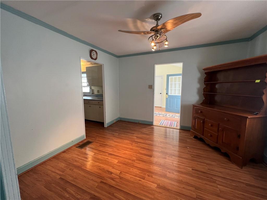 101 Filbert Road Butler, PA 16001 - Photo 6 of 37 wooden floor in an empty room with a window