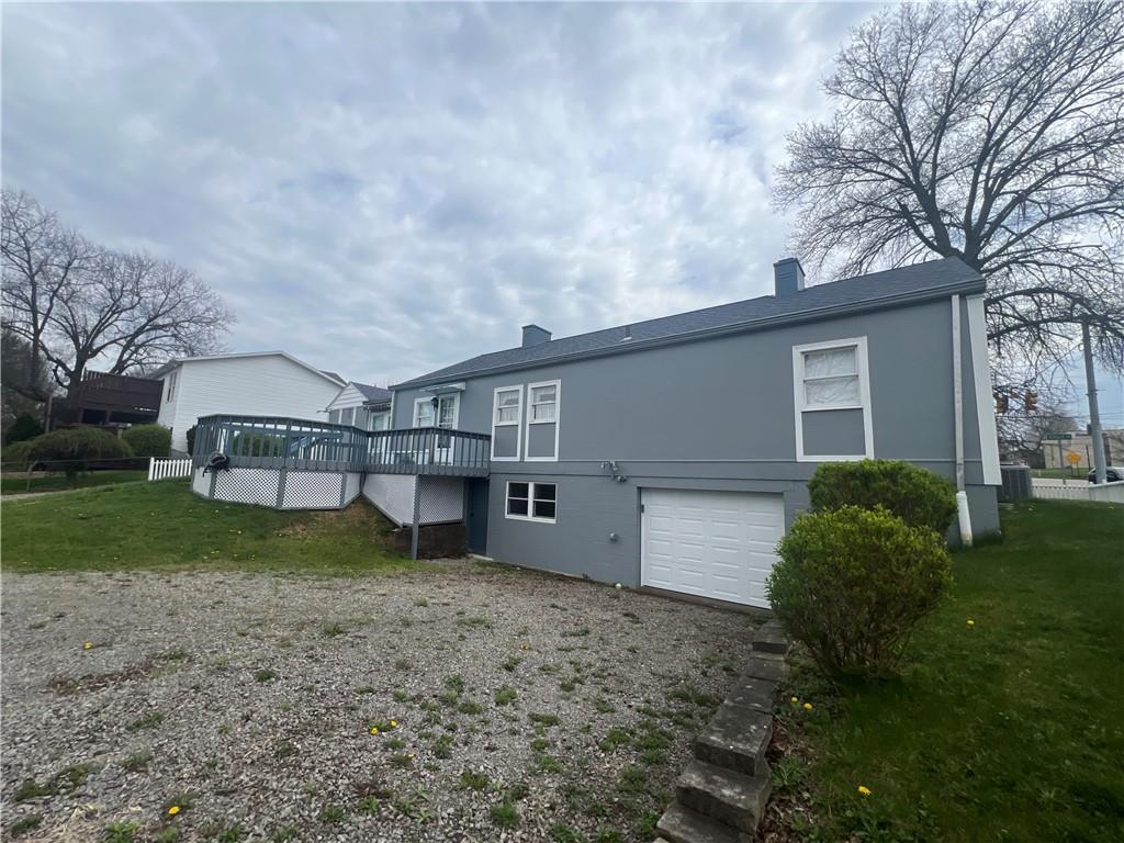 101 Filbert Road Butler, PA 16001 - Photo 6 of 40 a view of a house with a yard and a large tree