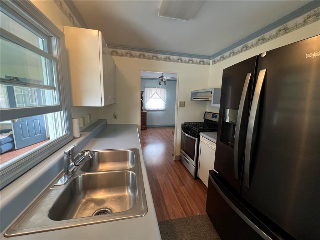 101 Filbert Road Butler, PA 16001 - Photo 8 of 37 a kitchen with a refrigerator and a sink