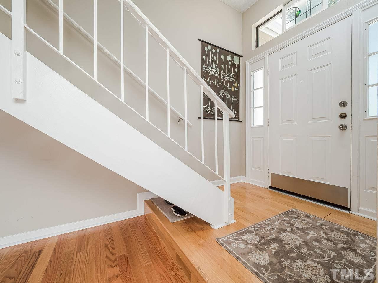 7746 Falcon Rest Circle, Unit 7746 Raleigh, NC 27615 - Photo 3 of 20 Light and airy 2-story condominium that lives like a townhome